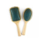 Dark green massage comb with round beech handle