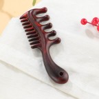 Handmade sandalwood massage comb