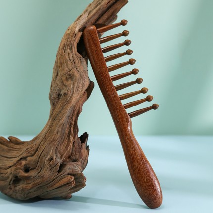 Natural sandalwood wavy wide-tooth massage comb